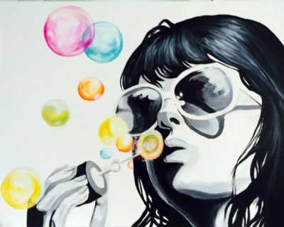 Blowing her dreams as bubbles