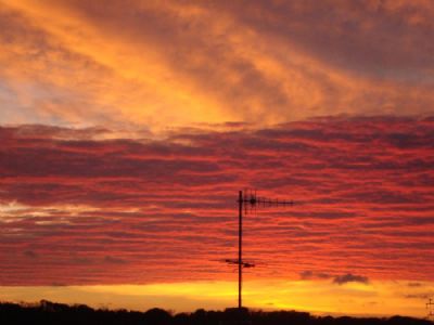 Solnedgang set fra mine vinduer mod nord