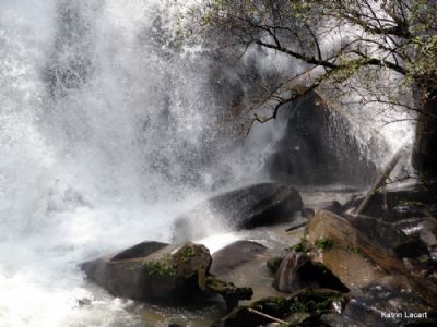 Under the waterfall